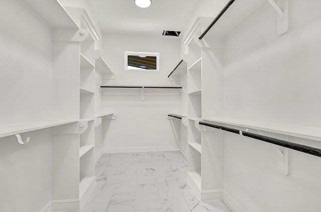 114 Little Spring Ct, Anahuac, TX 77514 - spacious closet featuring light marble finish floors