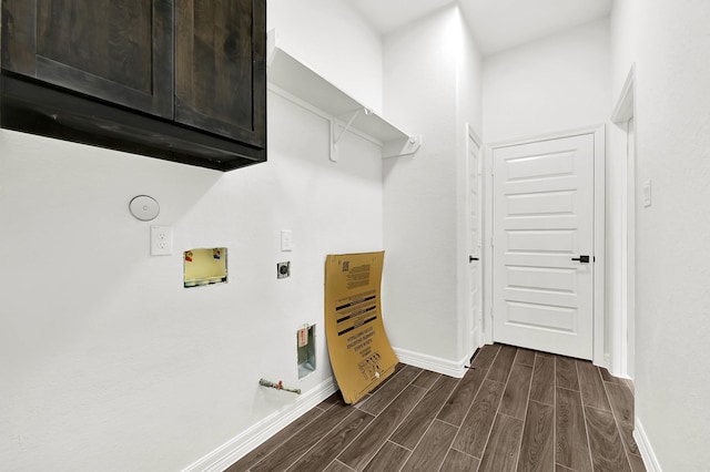 114 Little Spring Ct, Anahuac, TX 77514 - laundry room featuring dark wood-style flooring, hookup for a gas dryer, hookup for a washing machine, and hookup for an electric dryer