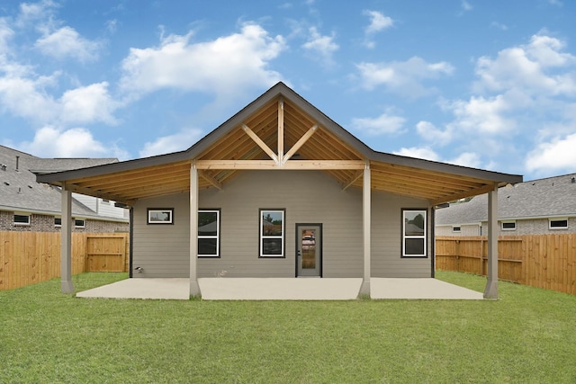 114 Little Spring Ct, Anahuac, TX 77514 - back of house featuring a patio area