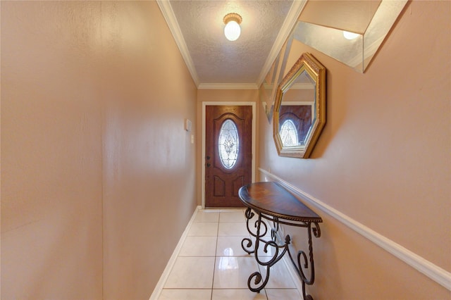 doorway to outside with light tile patterned floors, a textured ceiling, and ornamental molding