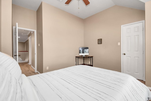 bedroom featuring ceiling fan, light colored carpet, and lofted ceiling