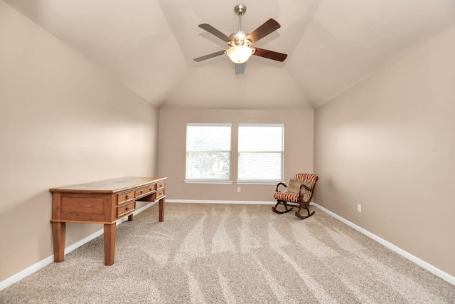 unfurnished room with light colored carpet, vaulted ceiling, and ceiling fan