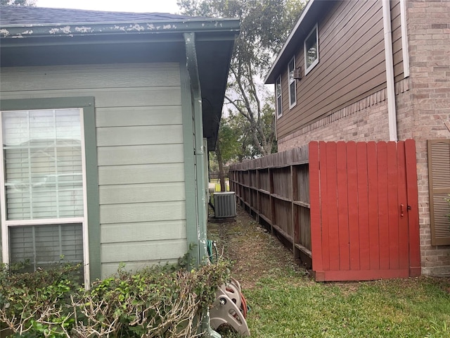 view of property exterior featuring central AC