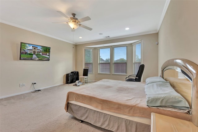 carpeted bedroom with ceiling fan and crown molding