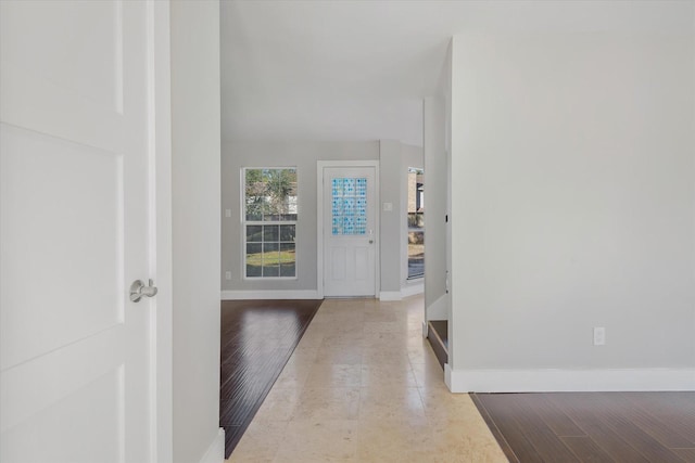 foyer with light hardwood / wood-style floors