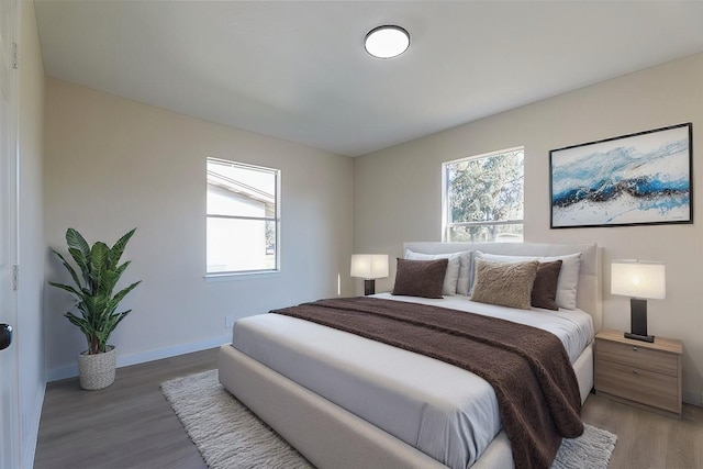 bedroom featuring hardwood / wood-style flooring