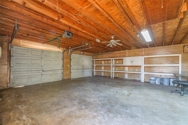 garage featuring a garage door opener and ceiling fan