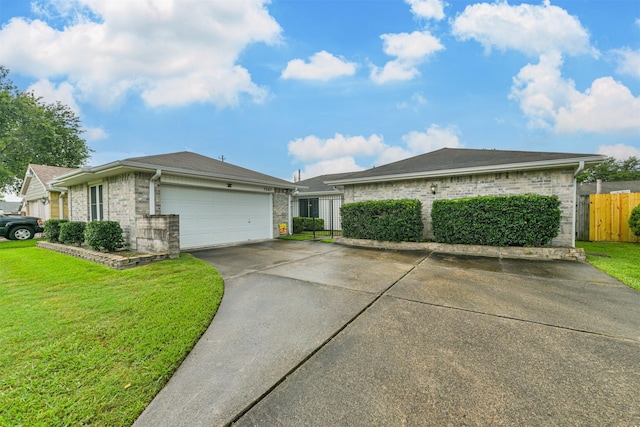 single story home featuring a front yard and a garage