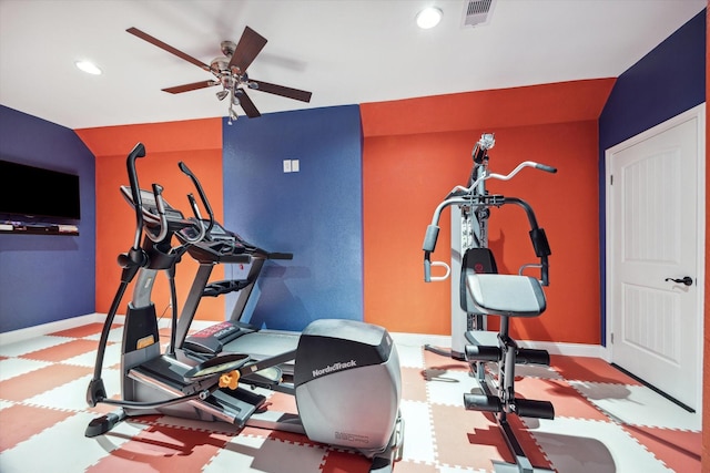 exercise area with ceiling fan and lofted ceiling