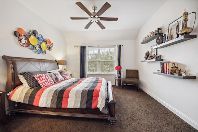 carpeted bedroom featuring vaulted ceiling and ceiling fan