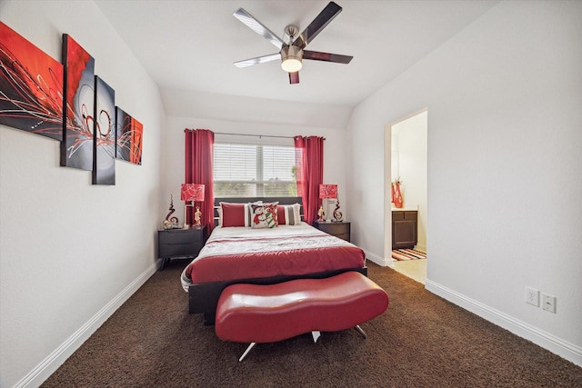 carpeted bedroom featuring ensuite bath, ceiling fan, and lofted ceiling