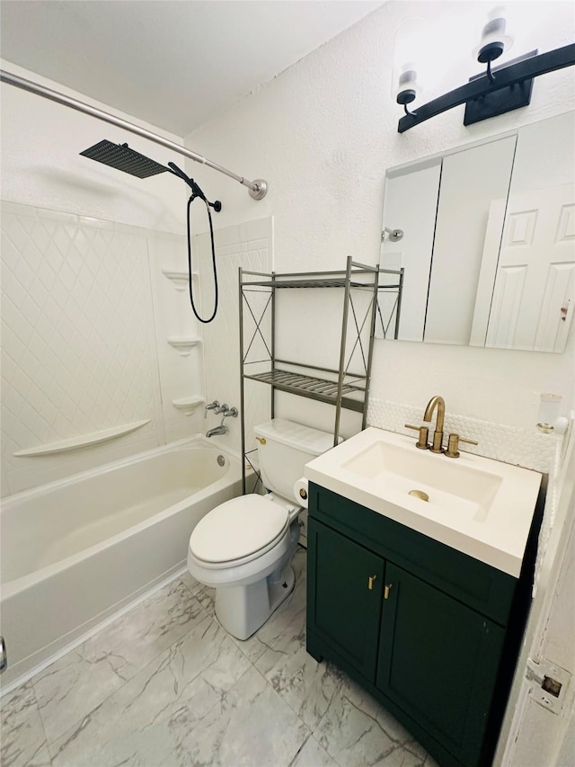 full bathroom featuring toilet, vanity, and tiled shower / bath