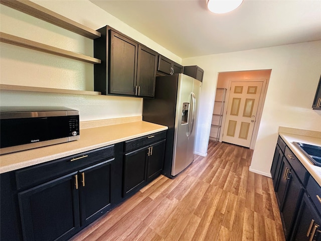 kitchen featuring light hardwood / wood-style floors and stainless steel appliances