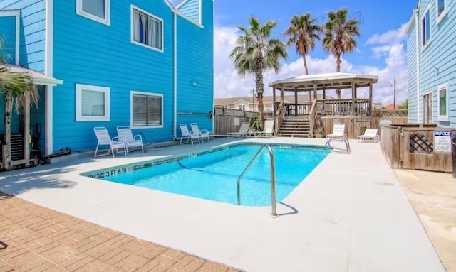 view of swimming pool with a gazebo