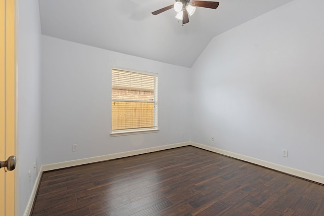 unfurnished room featuring ceiling fan, dark hardwood / wood-style flooring, and lofted ceiling