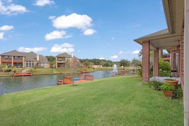 view of yard with a water view