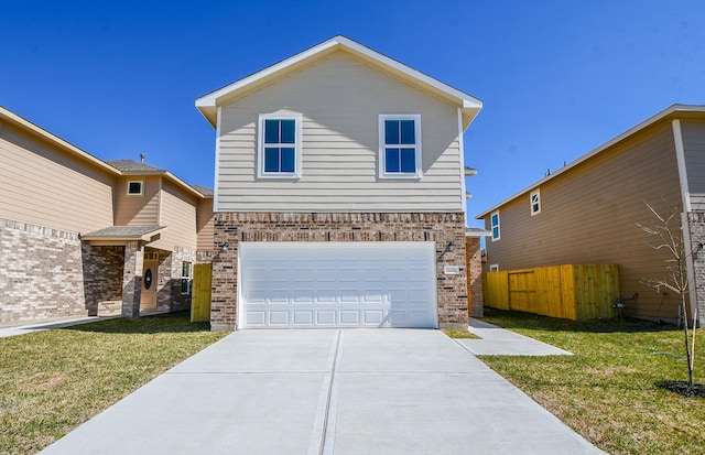 view of front property with a front yard and a garage