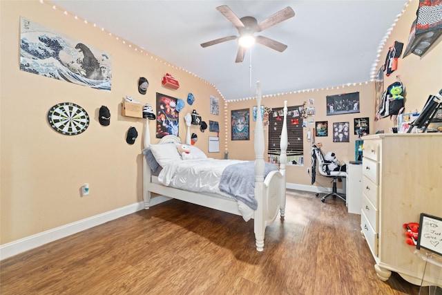 bedroom with ceiling fan and hardwood / wood-style floors