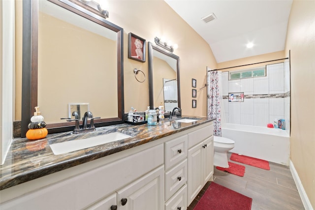 full bathroom featuring shower / bath combo, vaulted ceiling, toilet, vanity, and hardwood / wood-style flooring