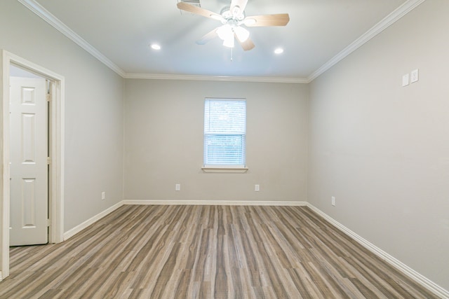 empty room with light hardwood / wood-style floors, ceiling fan, and crown molding