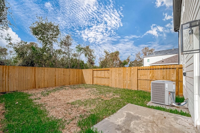 view of yard with central AC unit