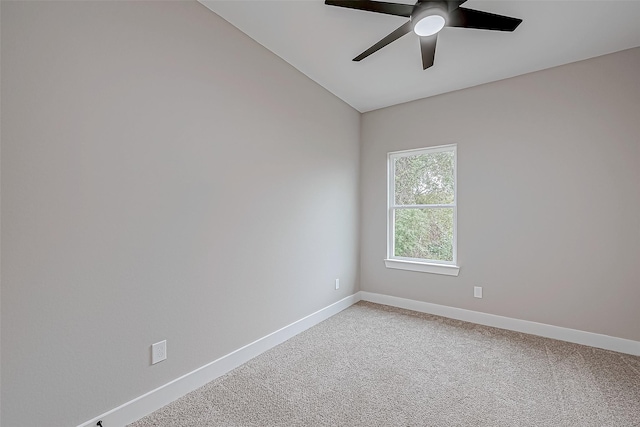 unfurnished room featuring ceiling fan, carpet floors, and lofted ceiling