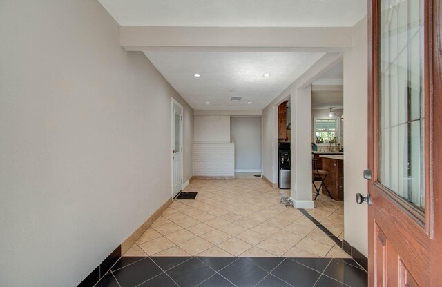 interior space featuring light tile patterned flooring