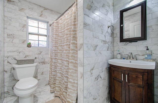 bathroom featuring curtained shower, vanity, tile walls, and toilet