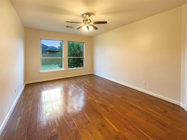 spare room featuring ceiling fan and wood-type flooring