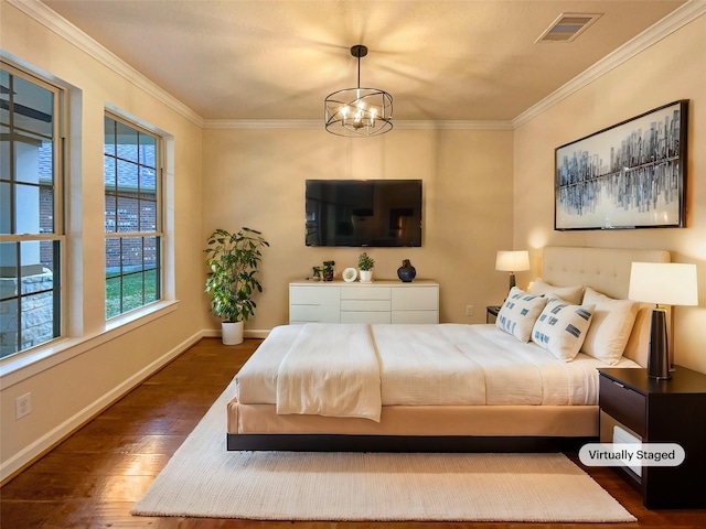 bedroom with a chandelier, crown molding, and dark wood-type flooring