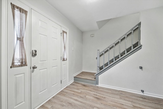 foyer with light hardwood / wood-style flooring