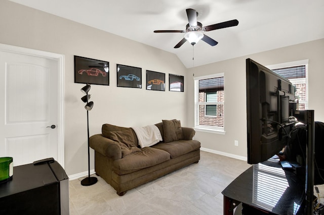 living room with vaulted ceiling and ceiling fan