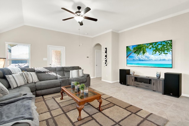 living room with ceiling fan, ornamental molding, and lofted ceiling