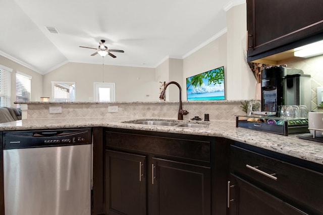 kitchen with lofted ceiling, sink, stainless steel dishwasher, decorative backsplash, and ceiling fan