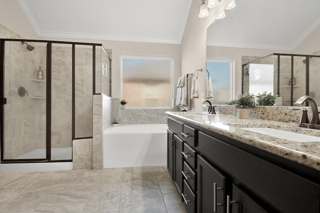 bathroom featuring vanity, lofted ceiling, and ornamental molding