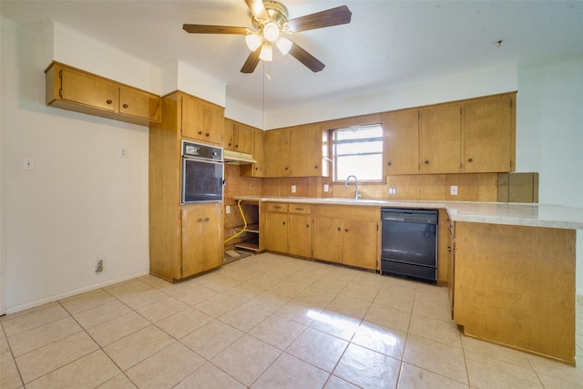 kitchen with backsplash, ceiling fan, light tile patterned floors, black dishwasher, and oven