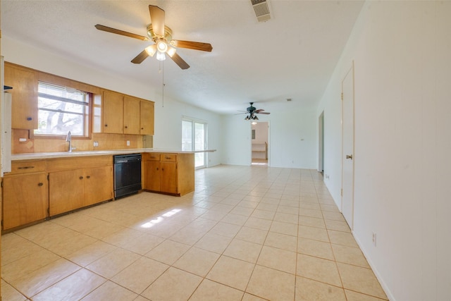 kitchen featuring ceiling fan, a textured ceiling, black dishwasher, light tile patterned flooring, and kitchen peninsula