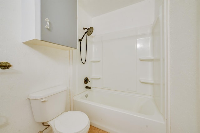 bathroom with bathtub / shower combination, tile patterned floors, and toilet