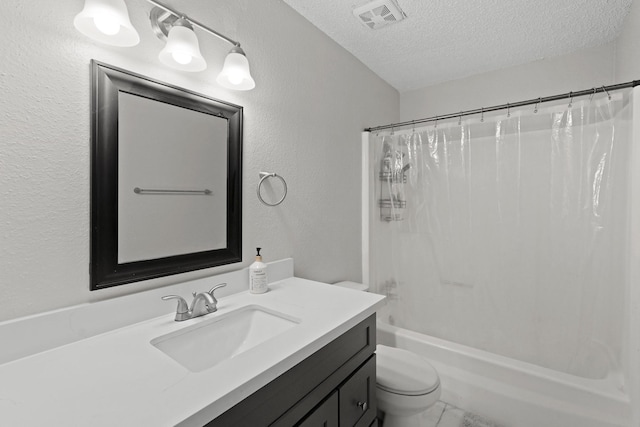 full bathroom with vanity, toilet, a textured ceiling, and shower / tub combo