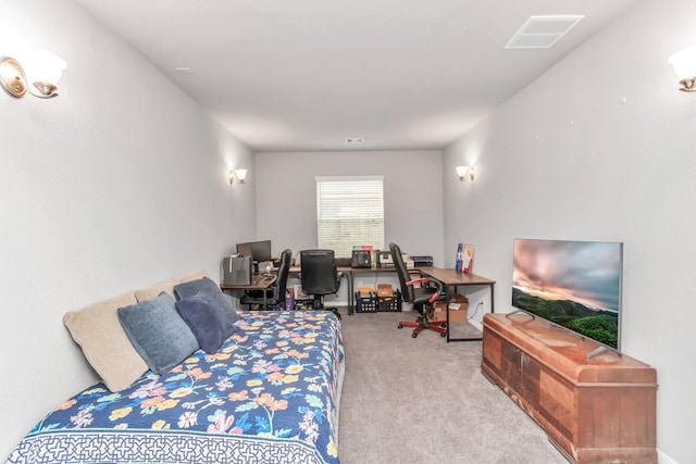 bedroom with light colored carpet