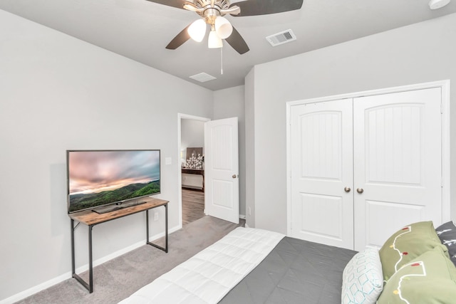 bedroom featuring carpet flooring, a closet, and ceiling fan