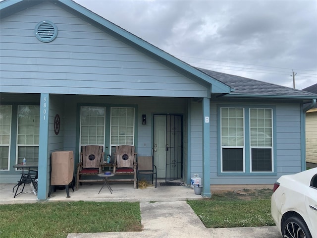 view of front of home featuring covered porch