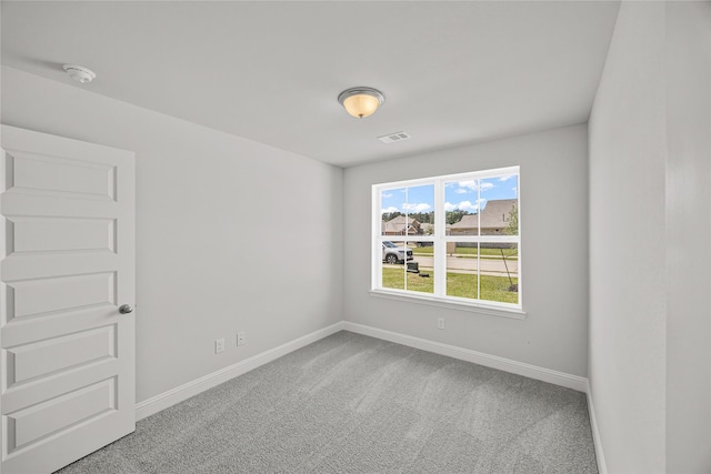 10318 Prairie Dunes Ln, Cleveland, TX 77327 - carpeted spare room featuring baseboards and a smoke detector
