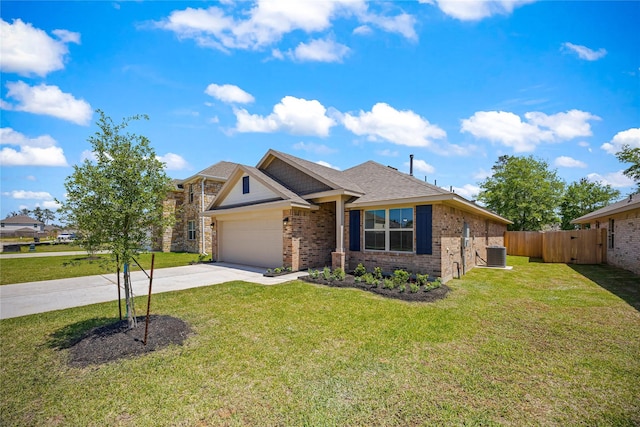 10318 Prairie Dunes Ln, Cleveland, TX 77327 - view of front facade with cooling unit, concrete driveway, an attached garage, brick siding, and a shingled roof