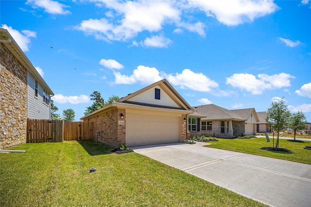 10318 Prairie Dunes Ln, Cleveland, TX 77327 - view of front of house featuring brick siding, driveway, an attached garage, and a gate