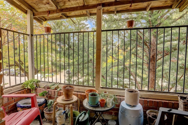 sunroom with beam ceiling