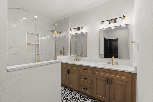 bathroom featuring vanity and a shower with shower door