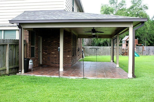 view of patio / terrace featuring ceiling fan and a playground