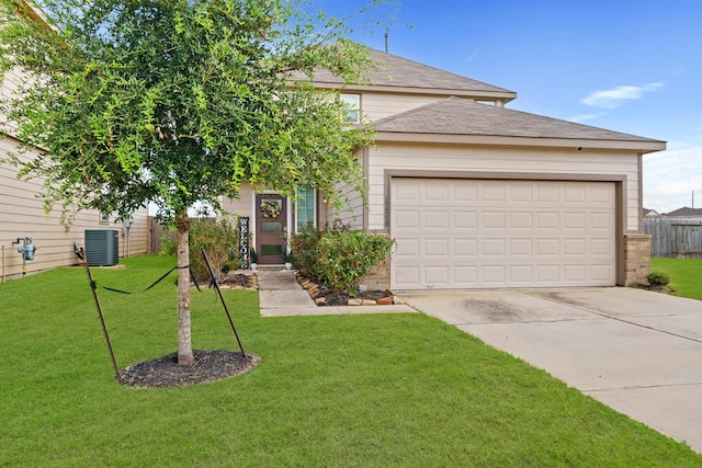 view of front of house with a garage, central air condition unit, and a front lawn