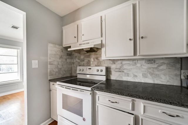 kitchen with white range with electric cooktop, white cabinets, tasteful backsplash, and light hardwood / wood-style flooring